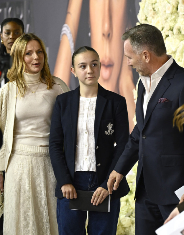 ג'רי מגיעה עם בעלה ובתו (צילום: Gareth Cattermole לגטי אימג'ס)