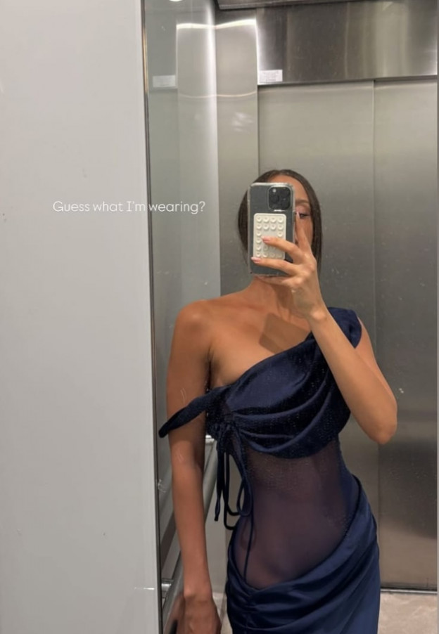 שמלה עם נפילות בד ושקיפויות (צילום: Neta Alchimister אינסטגרם)